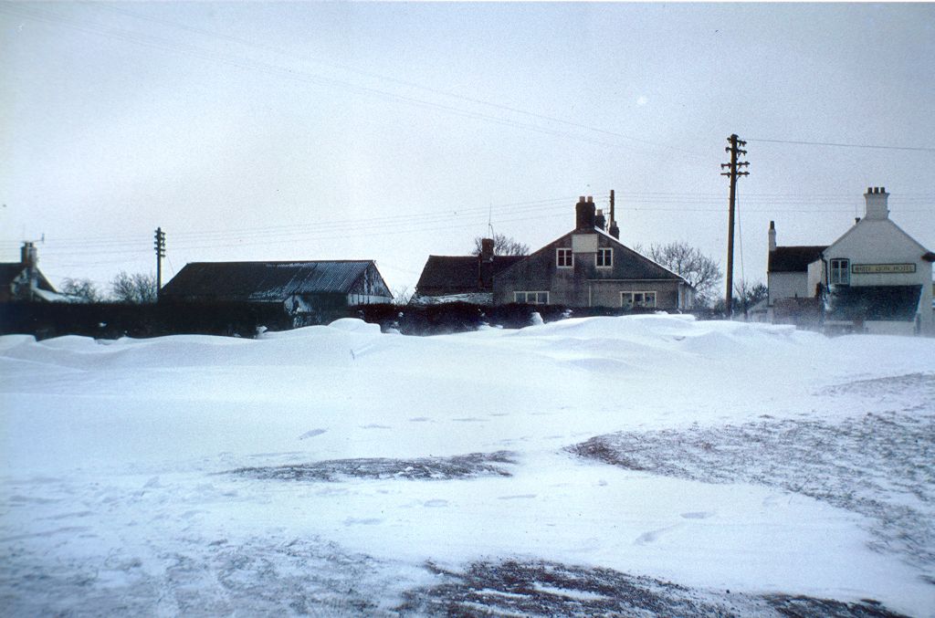 Hankelow snow scene in March 1965 (number 3) - View from Smithy Field of the Village Stores and the White Lion