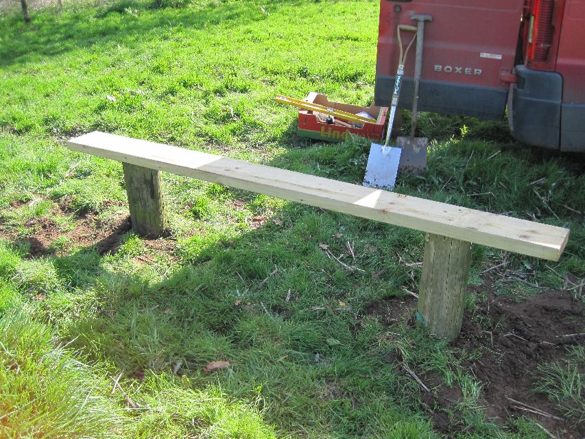 Erecting the bench by the River Weaver on the South Cheshire Way in April 2011
