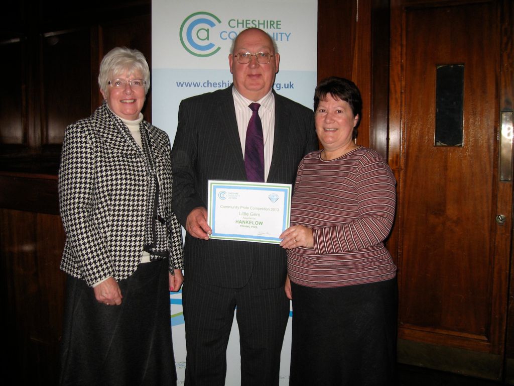 Villagers Ann Jones, Ian Jones and Val Morrey receive a Cheshire Pride Competition 2013 "Little Gem" award on behalf of Hankelow